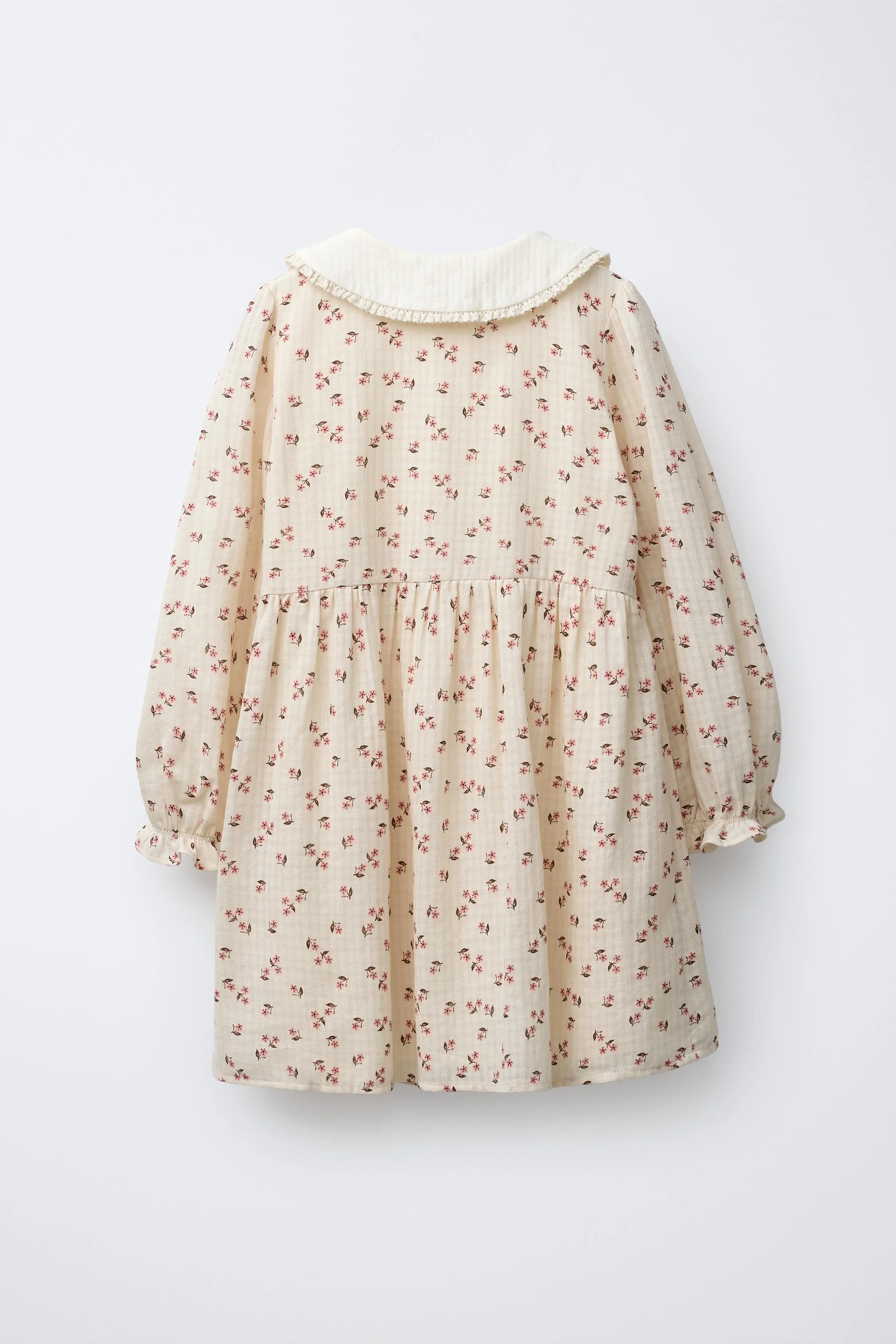 پیراهن طرح گلدار با یقه متضاد