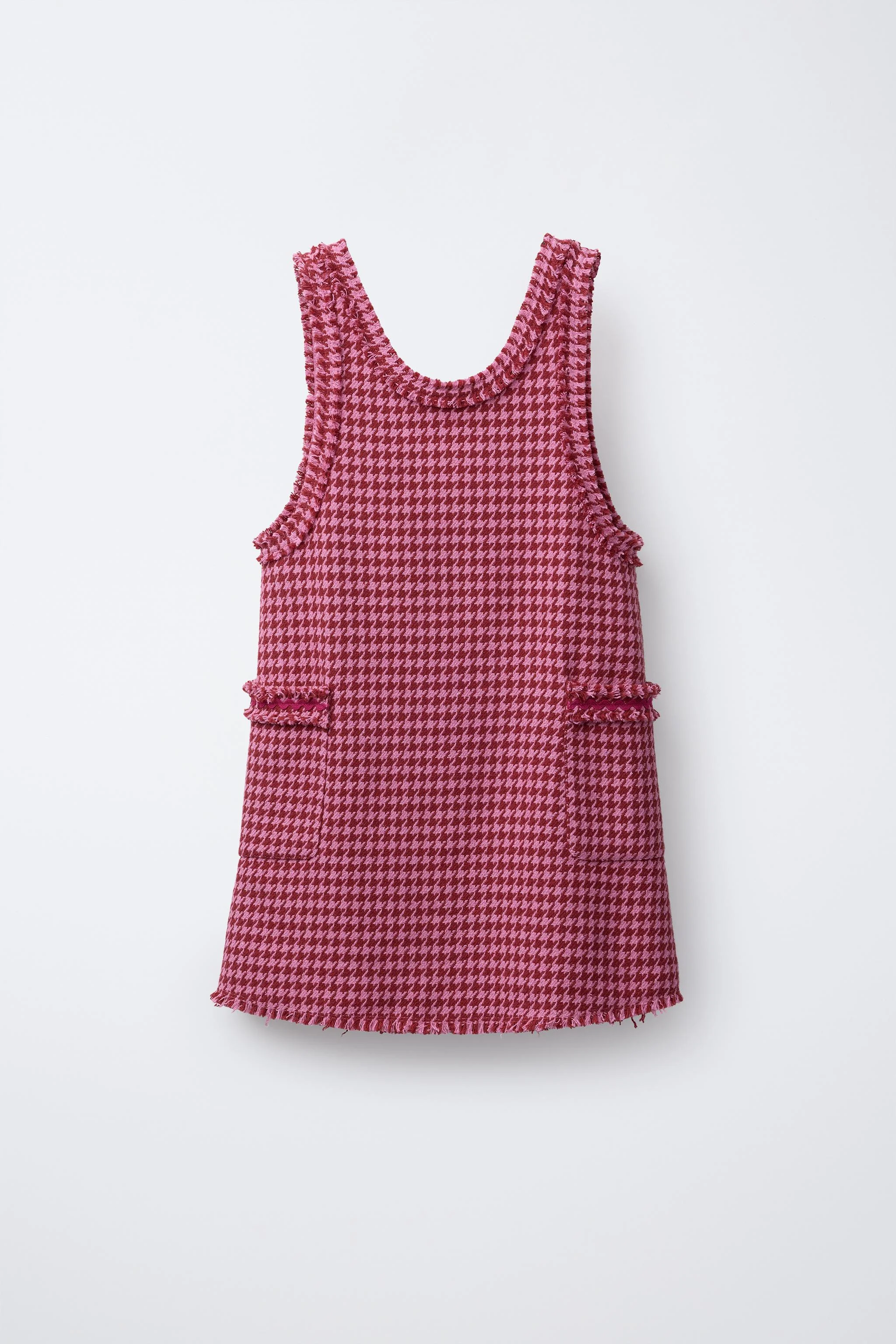 پیراهن پیشبندی بافت‌دار با جزئیات ریش‌ریش