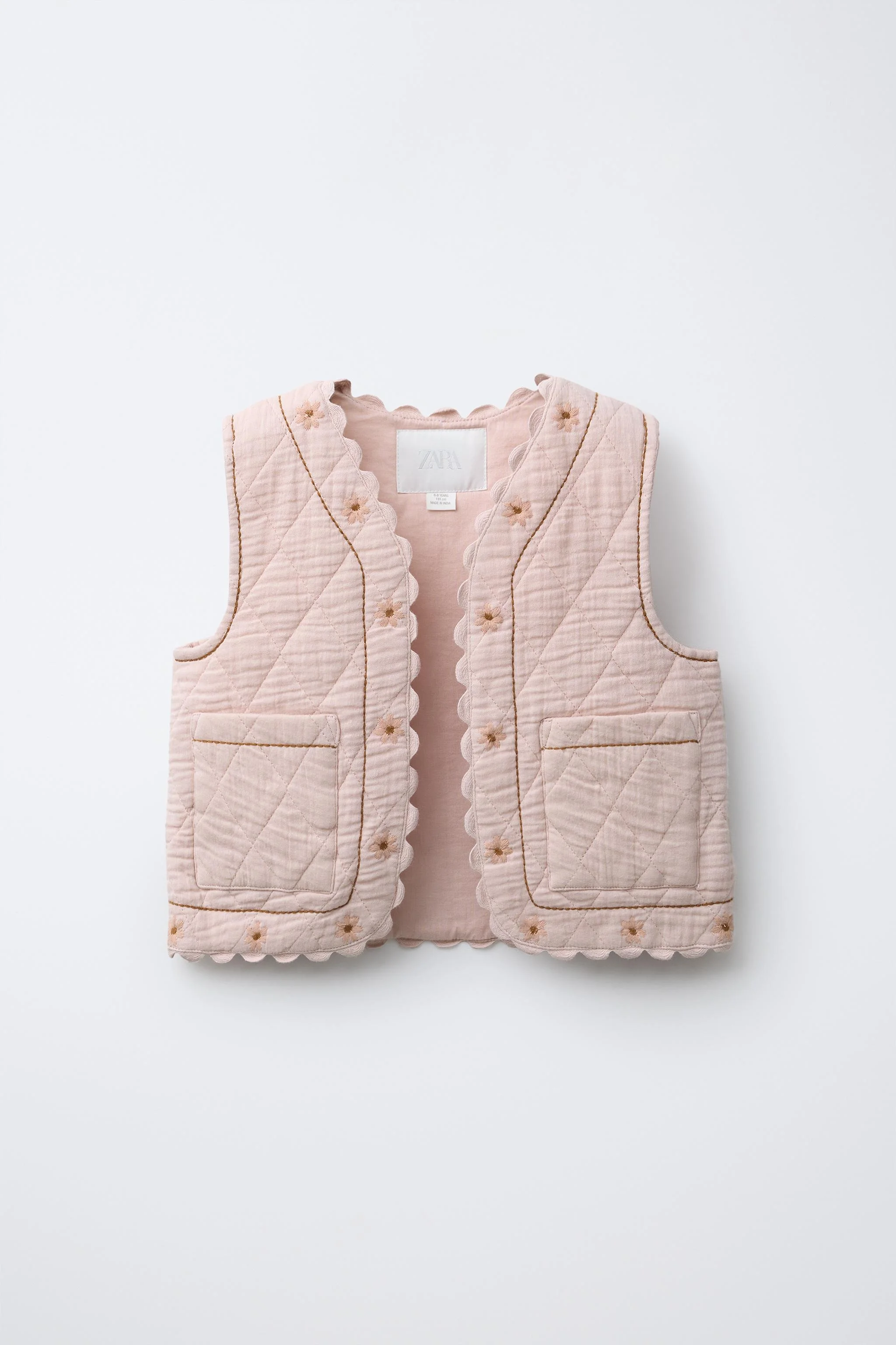 جلیقه با بافت گلدوزی شده طرح گل