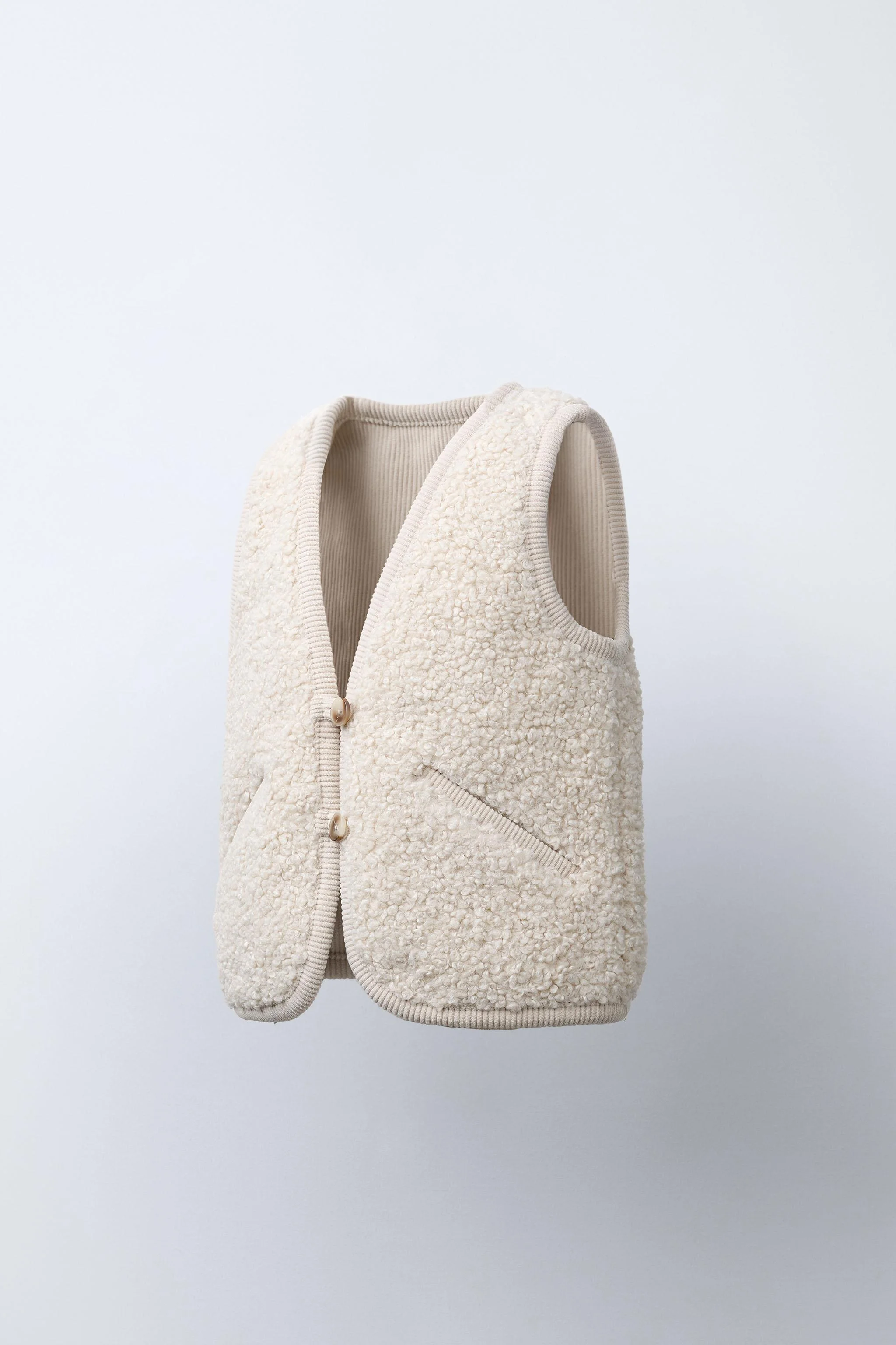 جلیقه مخمل کبریتی و طرح پوست بره