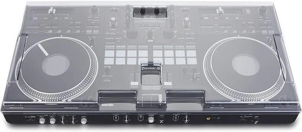 کاور محافظ Decksaver برای کنترلر Pioneer DDJ-REV7، بدنه پلی کربنات سخت، محافظت از چرخ‌های جاگ و کنترل‌های حساس، قالب‌گیری سفارشی، امکان اتصال کابل‌ها، شفاف دودی | DS-PC-DDJREV7