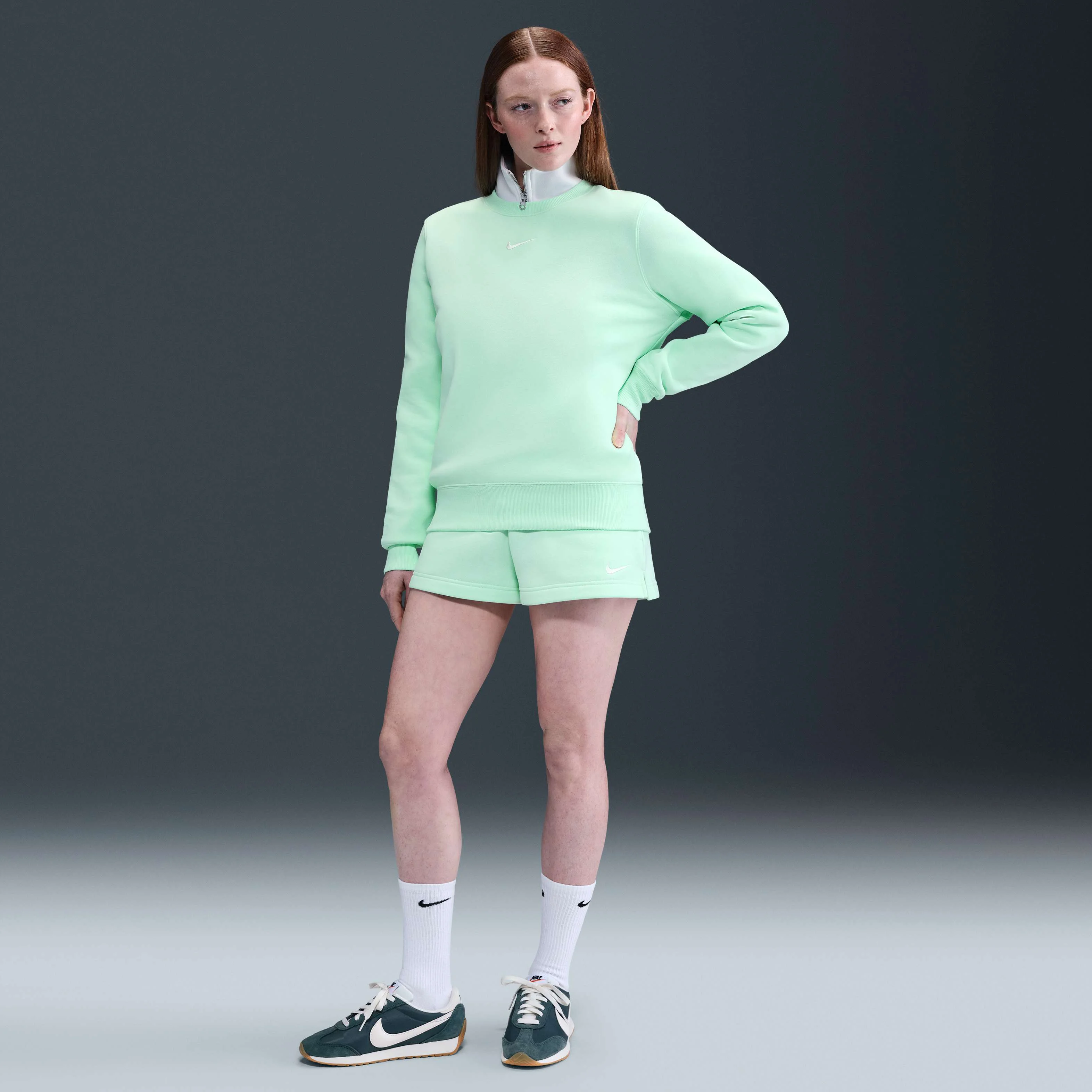 سویشرت زنانه یقه گرد Nike Sportswear Phoenix Fleece - فوم نعنایی/ بادبانی سویشرت زنانه یقه گرد Nike Sportswear Phoenix Fleece - فوم نعنایی/ بادبانی