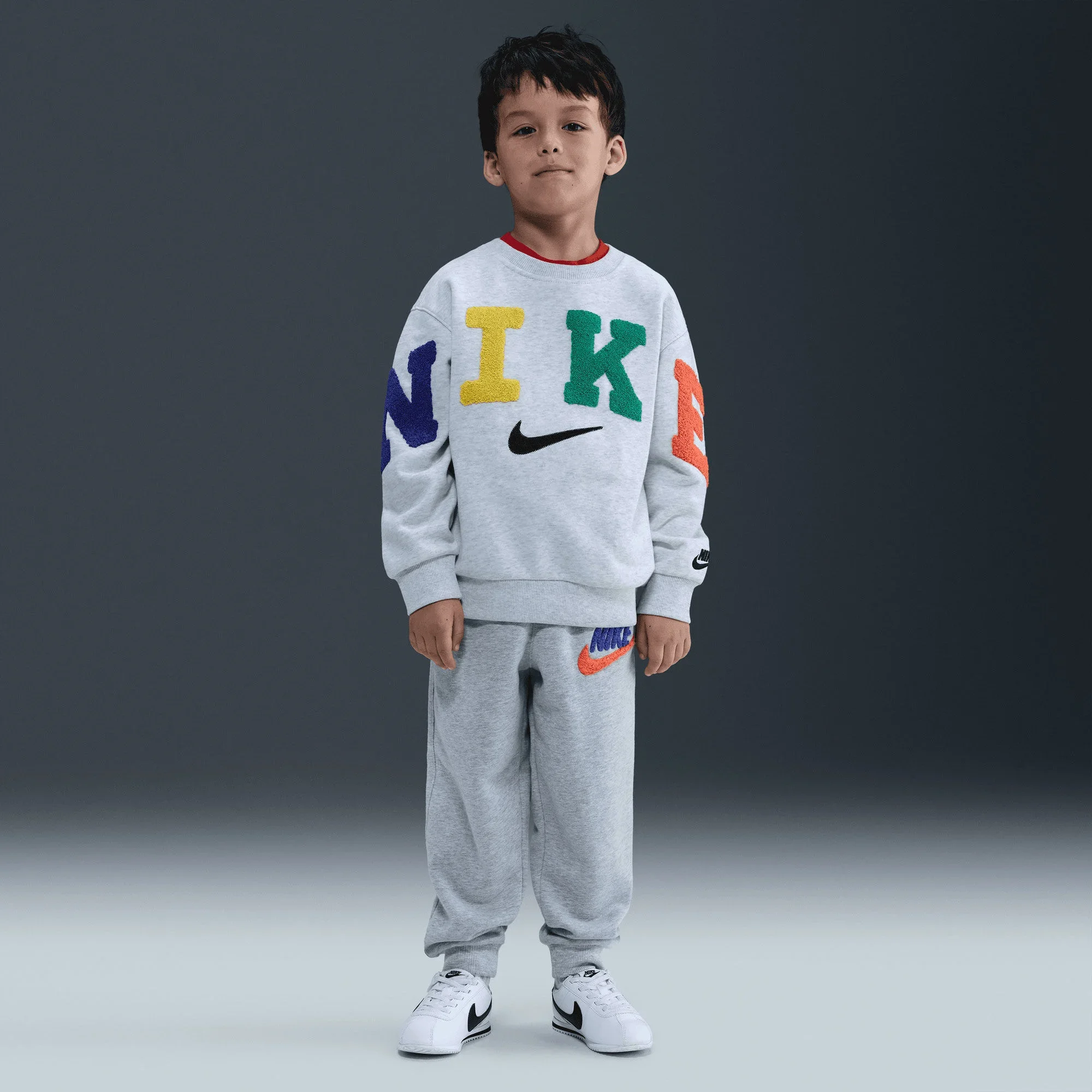 بلوز پشمی بچگانه نایکی مدل Club - هدر توس