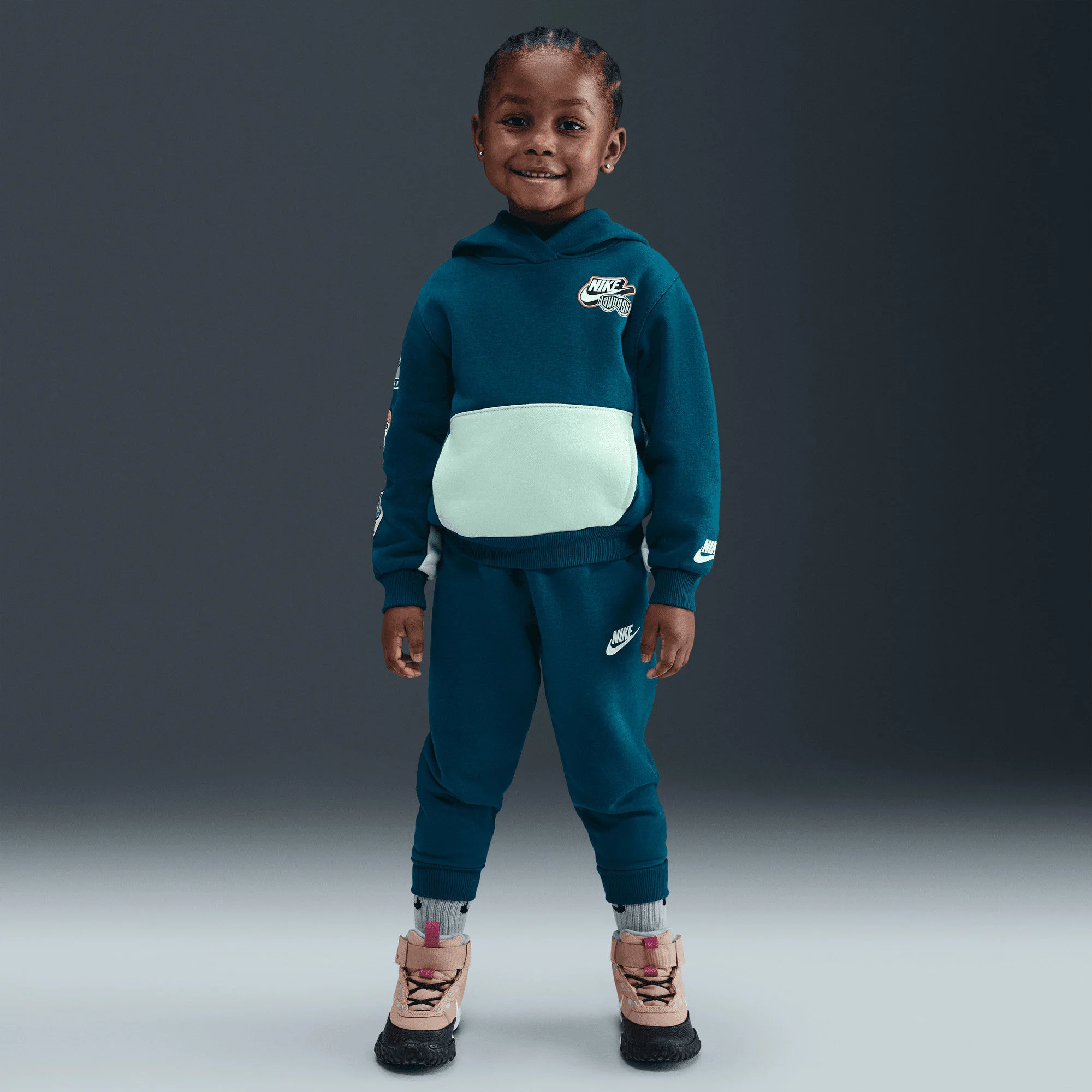 ست هودی پلوور پشمی و شلوار جاگر بچگانه نایک - آبی ست هودی پلوور پشمی و شلوار جاگر بچگانه نایک - آبی