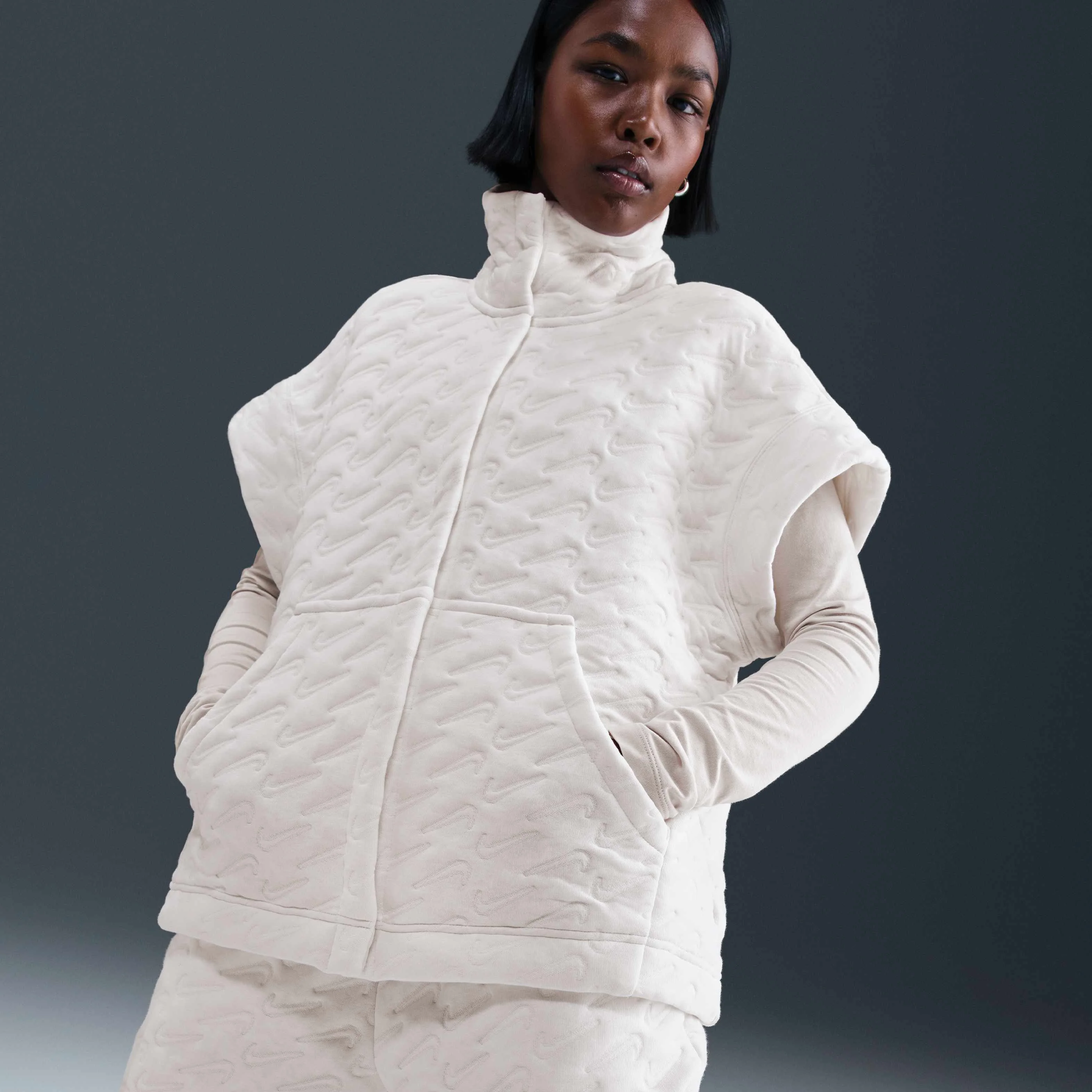 جلیقه زنانه نایکی اسپرتس ویر فونیکس فلیس طرح دار و بزرگ