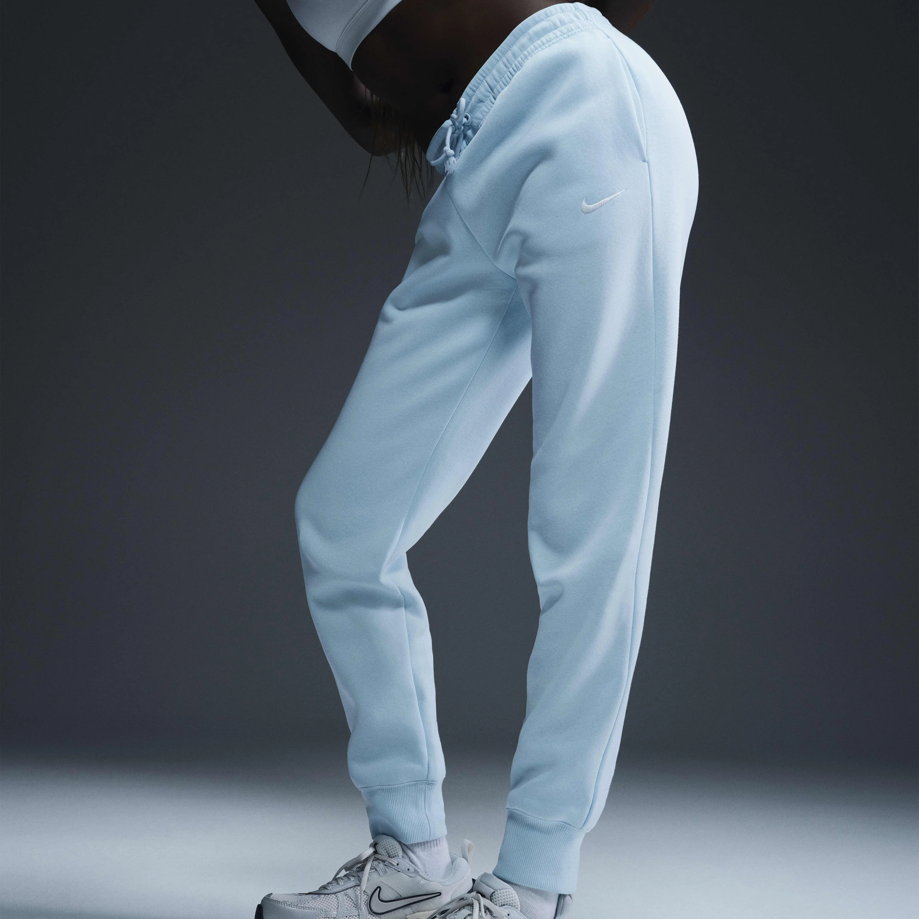 شلوار ورزشی زنانه نایک اسپرتس ویر فونیکس فلیس با فاق متوسط شلوار ورزشی زنانه نایک اسپرتس ویر فونیکس فلیس با فاق متوسط