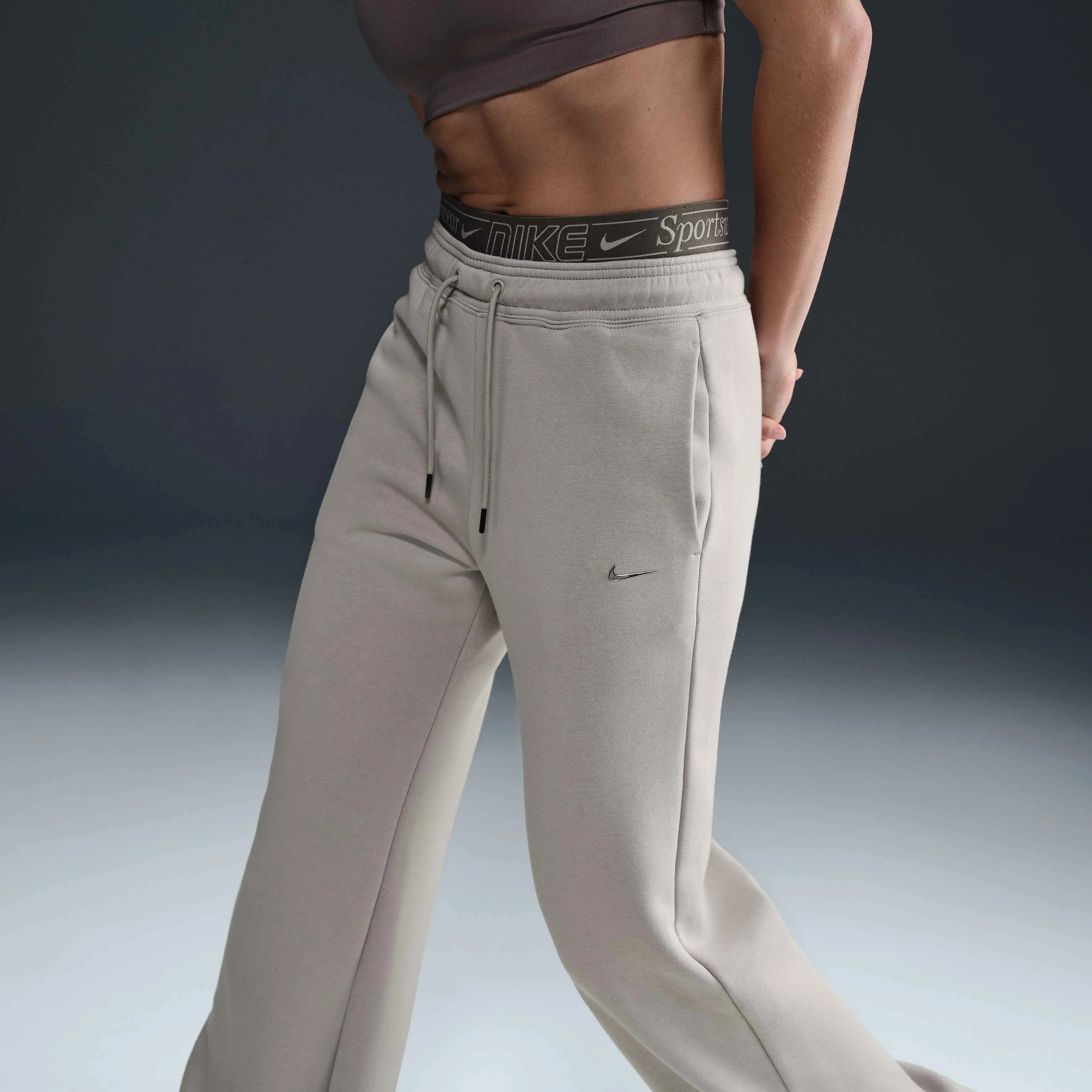 شلوار ورزشی زنانه کمر بلند Nike Sportswear Phoenix Fleece - خاکستری کالج شلوار ورزشی زنانه کمر بلند Nike Sportswear Phoenix Fleece - خاکستری کالج