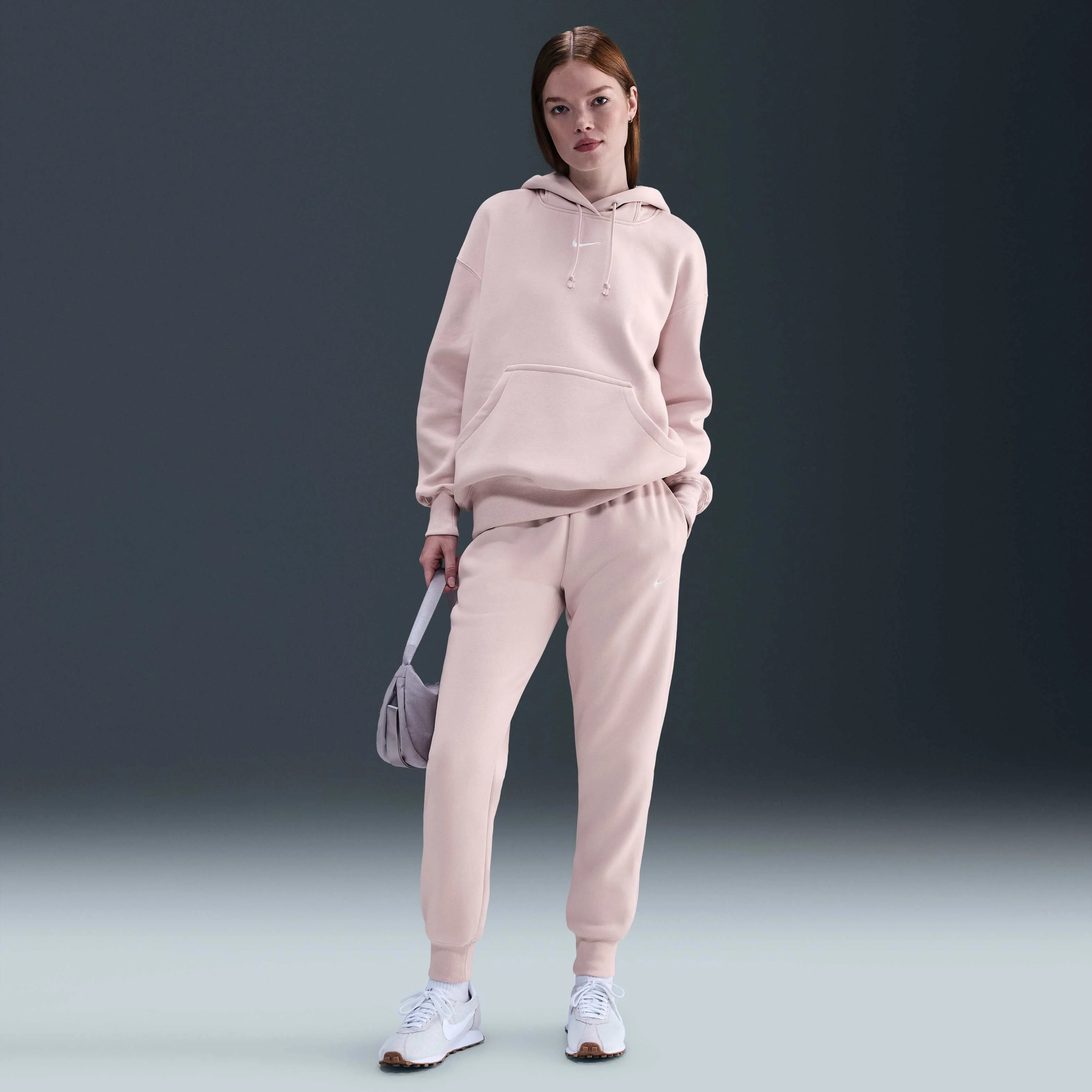 شلوار ورزشی زنانه نایک اسپرتس ویر فونیکس فلیس با فاق متوسط شلوار ورزشی زنانه نایک اسپرتس ویر فونیکس فلیس با فاق متوسط