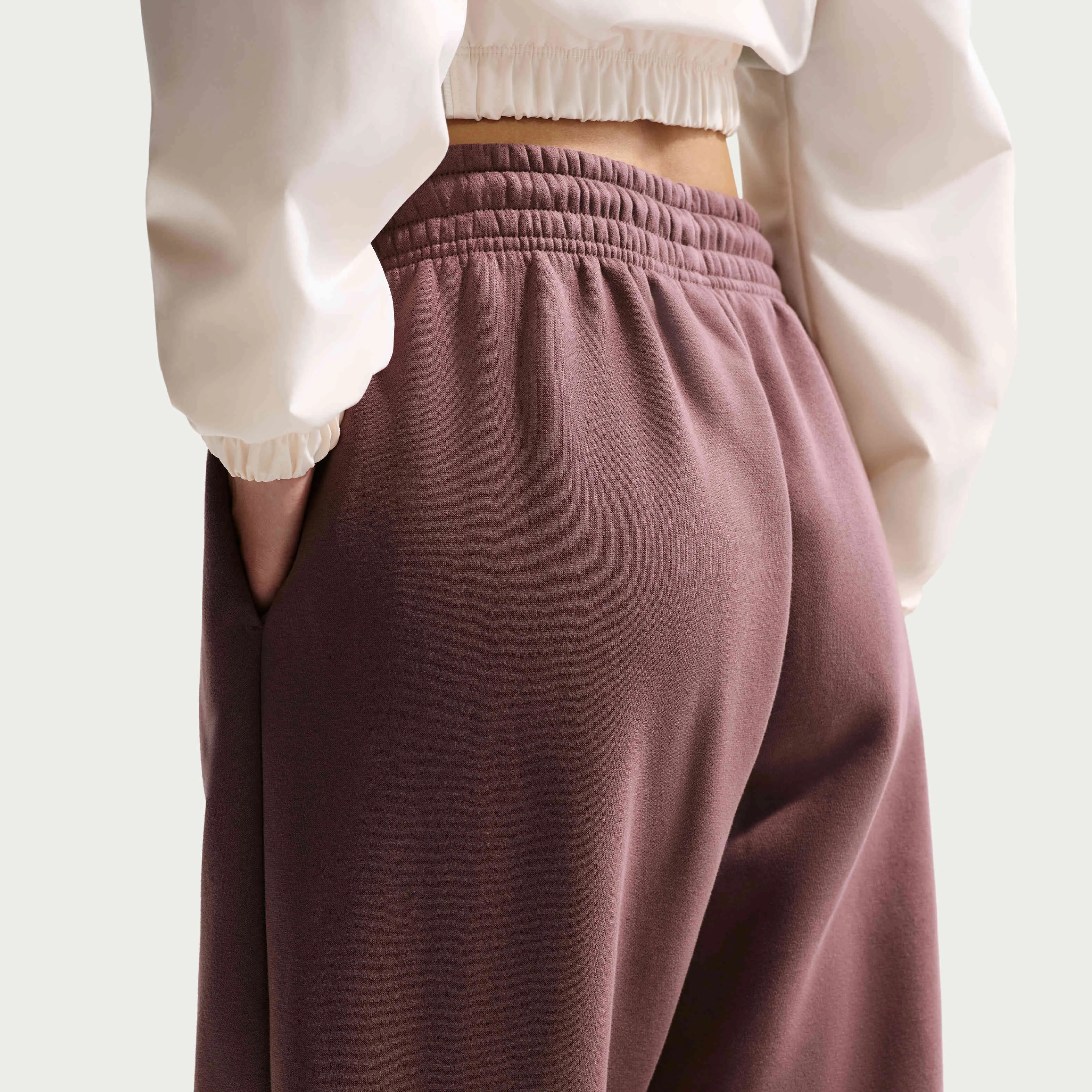 شلوار ورزشی زنانه نایکی اسپرتسویر فونیکس پشمی کمر بلند و بزرگ