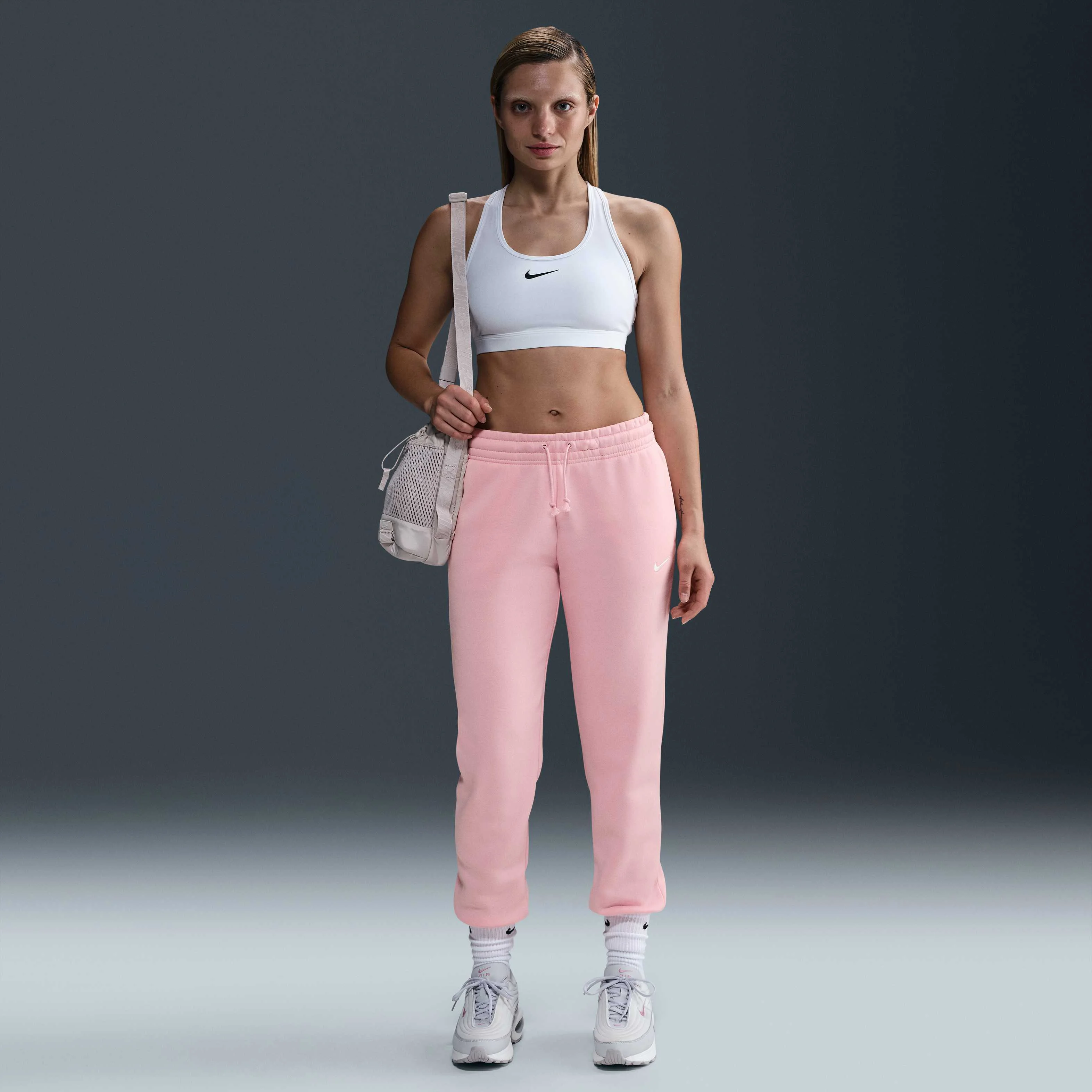 شلوار ورزشی زنانه نایک اسپرتس ویر فونیکس فلیس با فاق متوسط شلوار ورزشی زنانه نایک اسپرتس ویر فونیکس فلیس با فاق متوسط