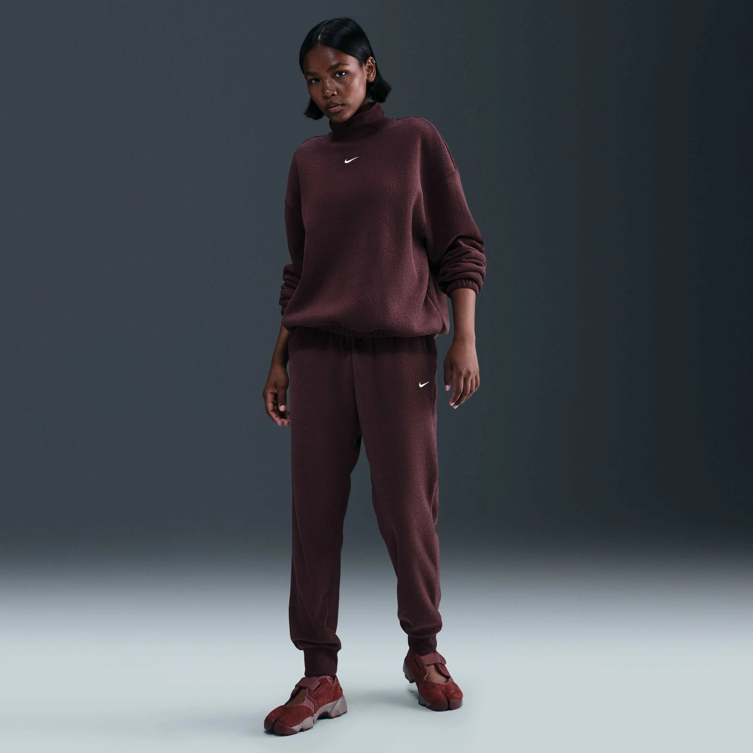 تاپ پشمی زنانه نایکی اسپرتس ویر فونیکس پلااش با یقه اسکی و سایز بزرگ