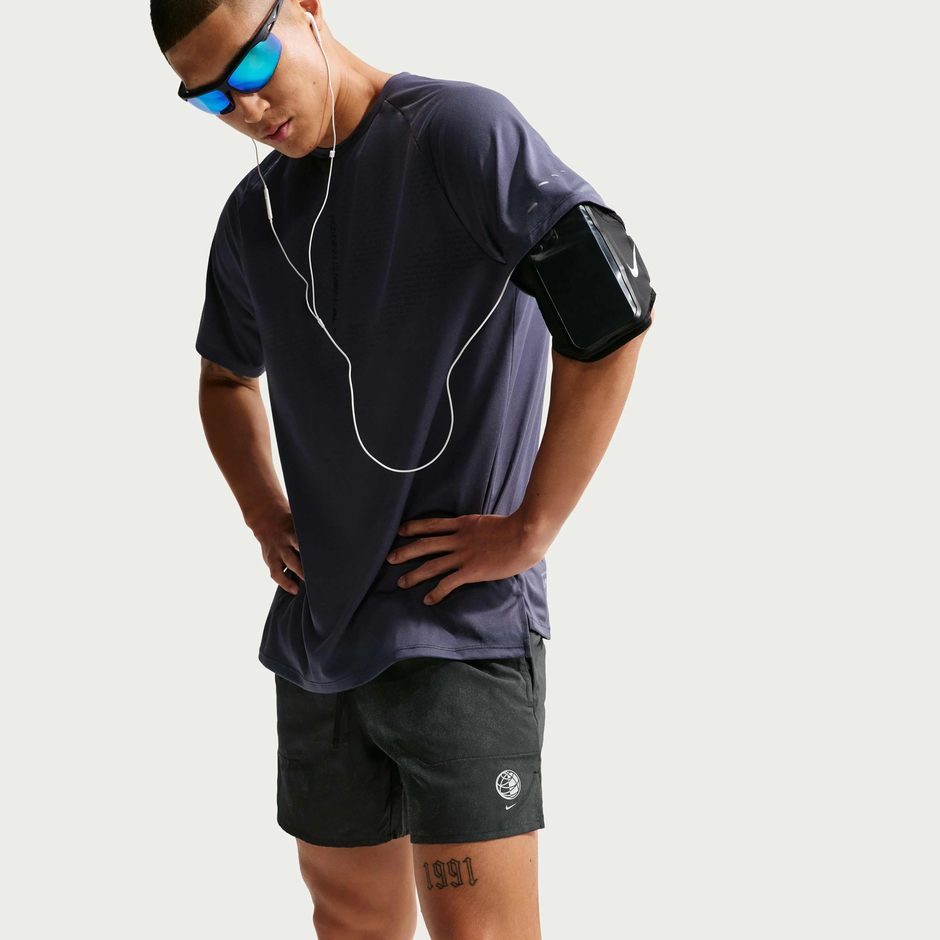 شورت ورزشی مردانه نایکی استراید با طول 5 اینچ و طراحی بازتابنده شورت ورزشی مردانه نایکی استراید با طول 5 اینچ و طراحی بازتابنده