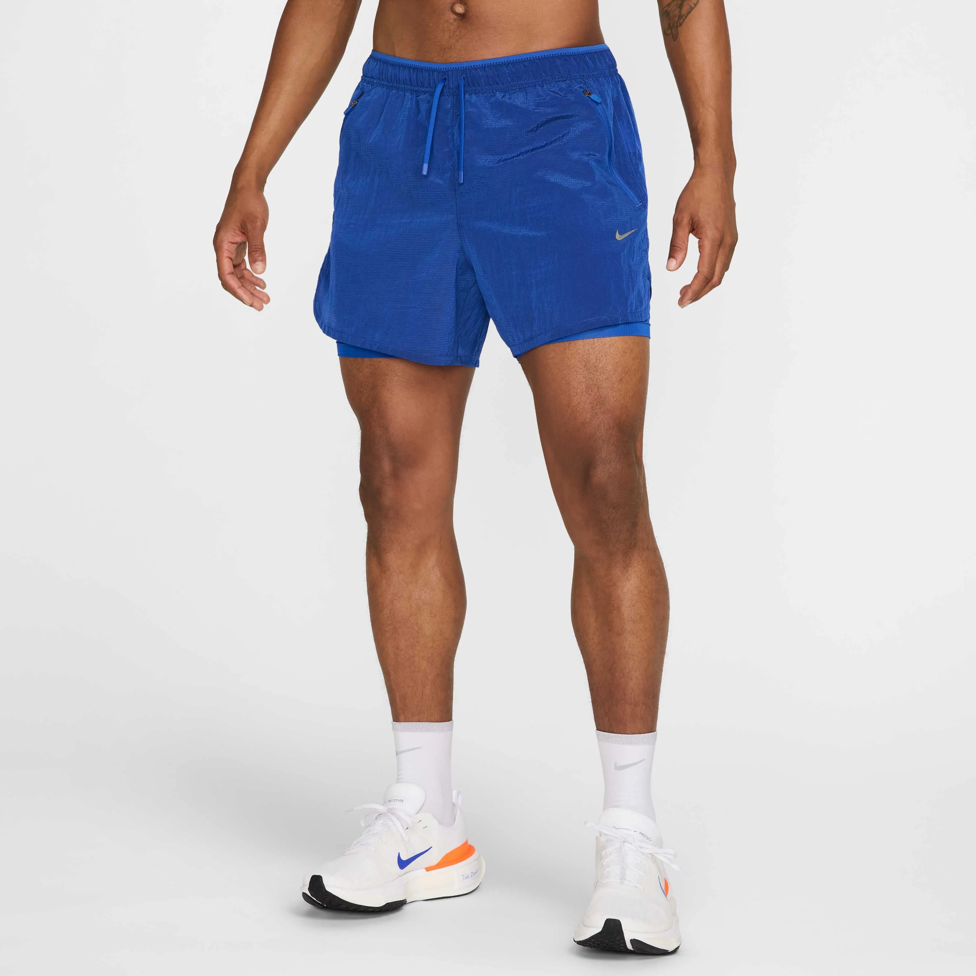 شورت ورزشی مردانه نایکی استراید رانینگ دیویژن 13 سانتی‌متری (تقریبی) ضدآب و دارای فناوری Dri-FIT مدل 2 در 1