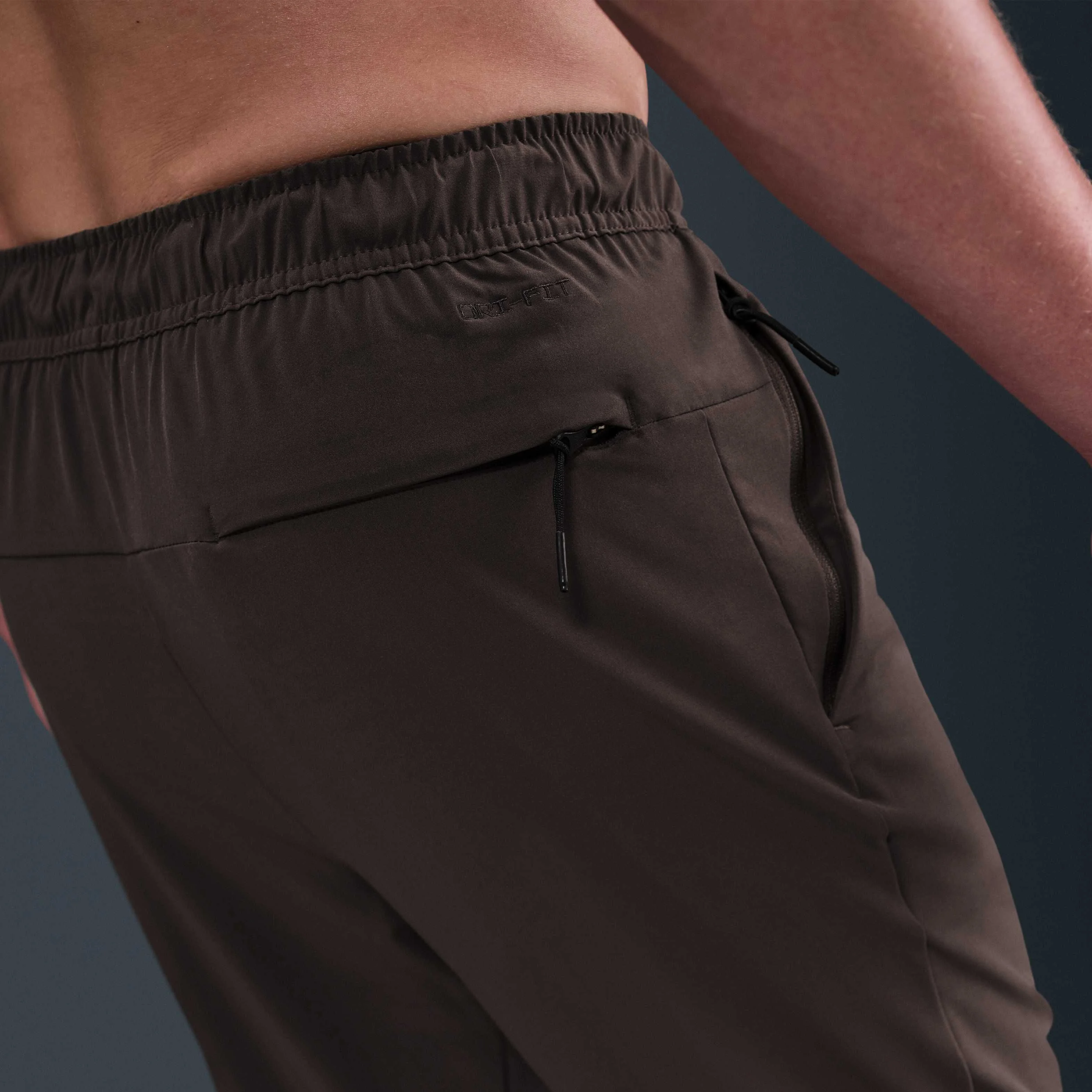 شلوار ورزشی مردانه نایکی Unlimited Dri-FIT با زیپ در قسمت مچ پا