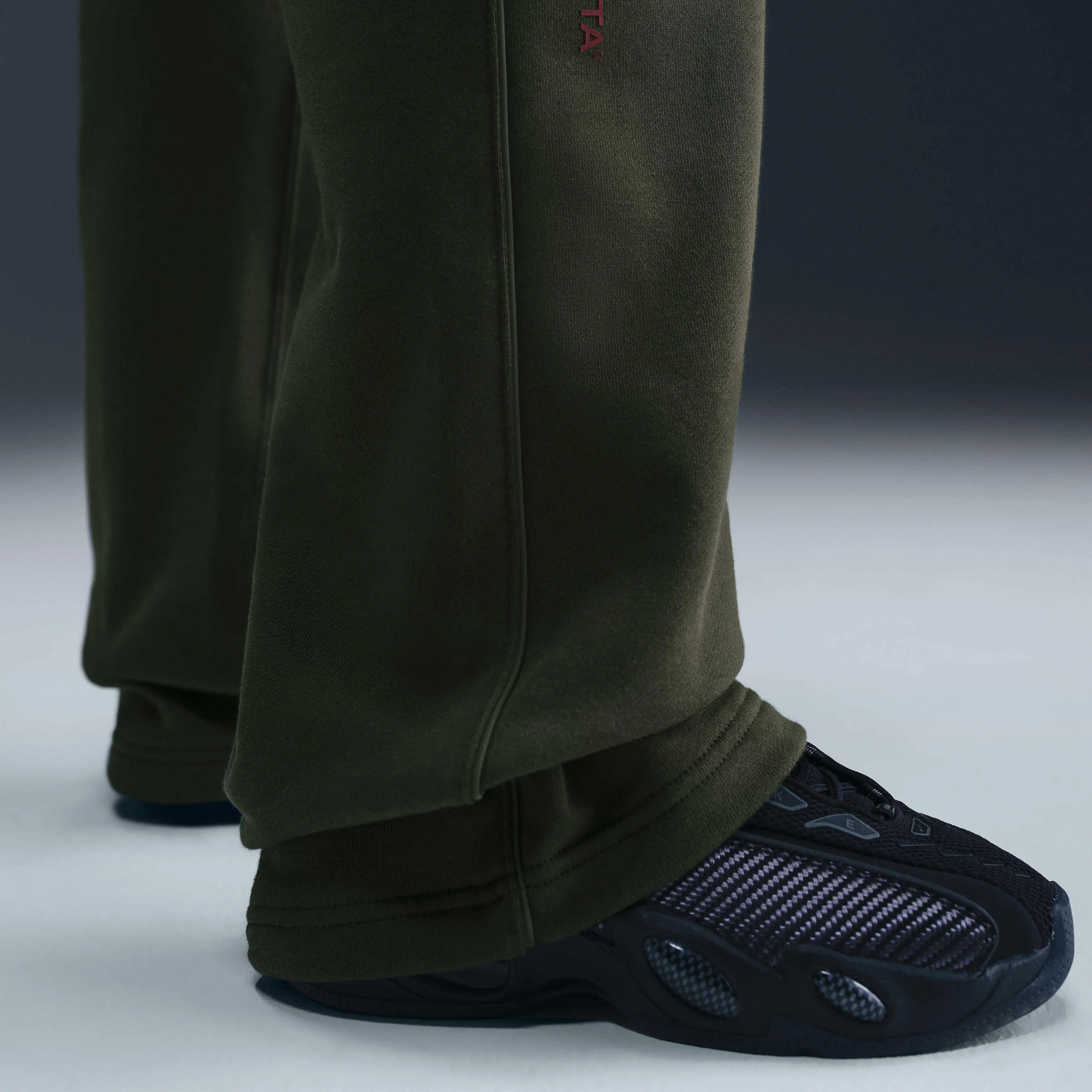 شلوار گرمکن پایین باز پشمی نایک نوکتا